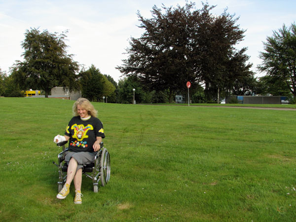 Sylvia in a wheelchair on the grass