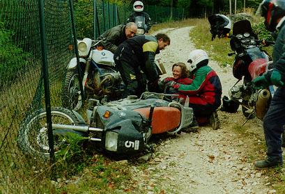 Sylvia fallen of her bike, a BMW R80 Basic next to her