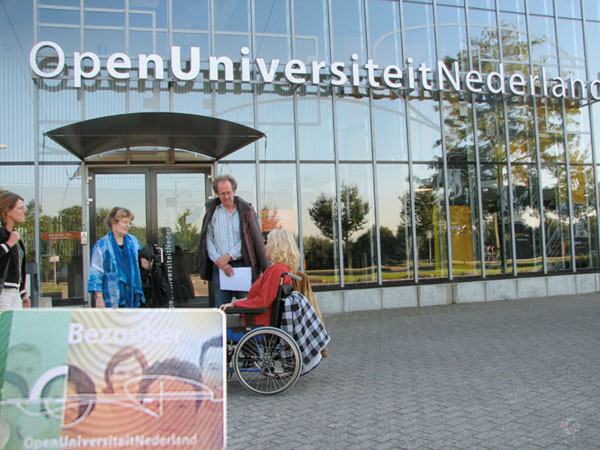 Sylvia in a wheelchair at the Open University