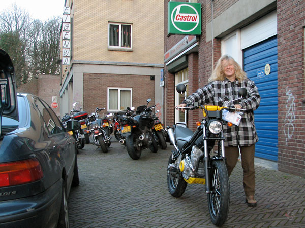 Sylvia glad, with a Yamaha Tricker in her hands