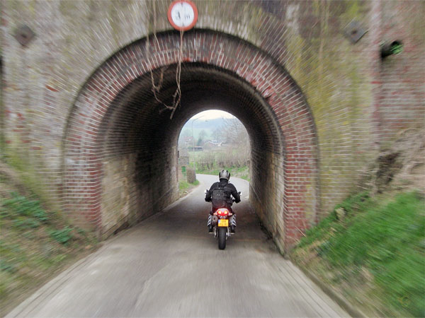 Motorcycle through a small tunnel