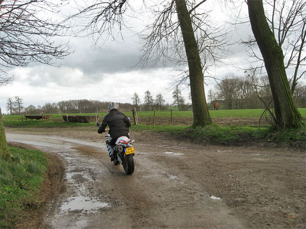 Motorcycle on a muddy road