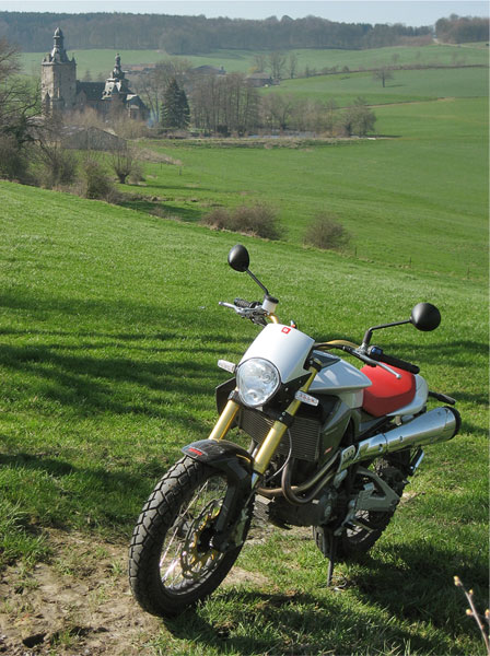 Motorcycle with castle in the background