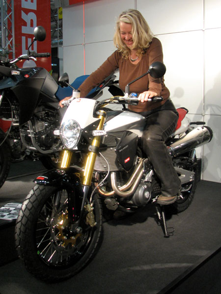 Sylvia sitting on the Derbi Mulhacen