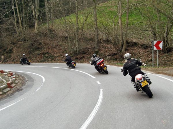  several motorcycles in a corner