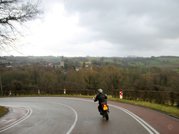 Tricker, with a view on a village in a valley