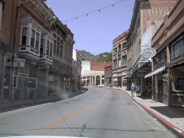 Street with old-fashioned huses and shops, two or three stories high