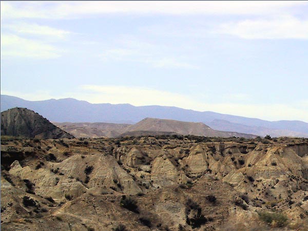 South-west USA like landscape of coloured bare rounded rocks