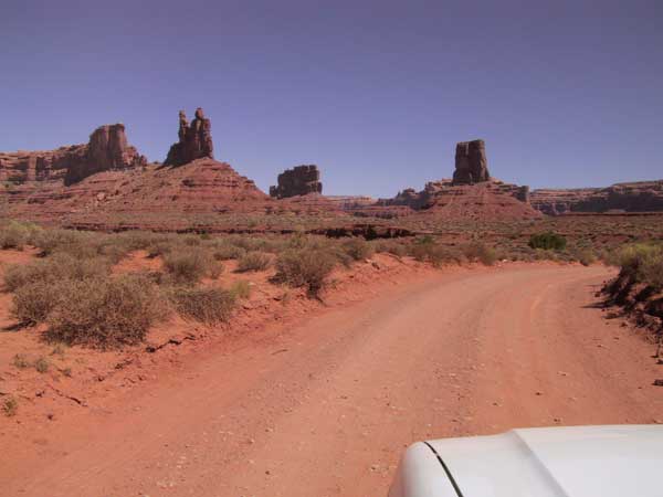 Red dirtroad and red single rocks