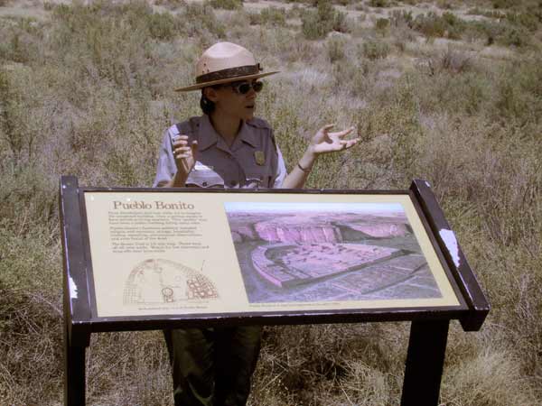 Guide near an information sign