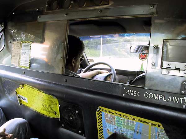 Inside the taxi: number for complaints
