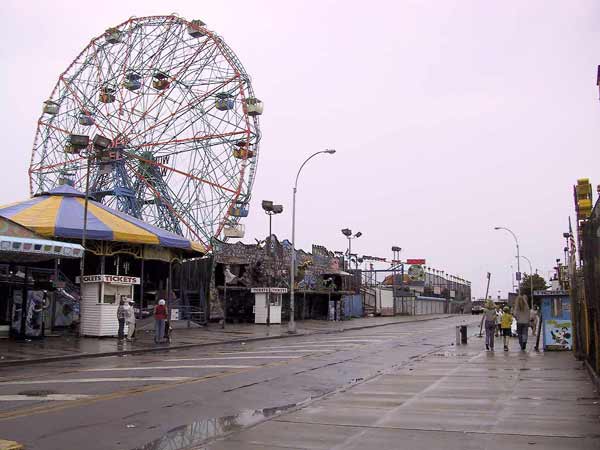 Rainy street and ferris wheel