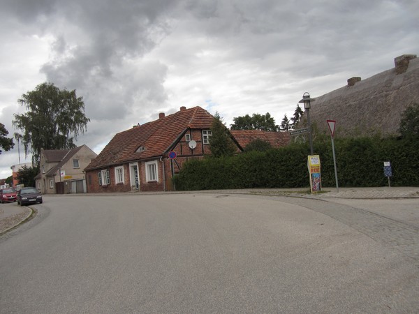 Vakwerkhuis en huis met strodak