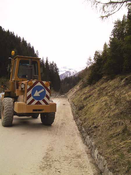 Works high in the Alps: snowy mountains in sight