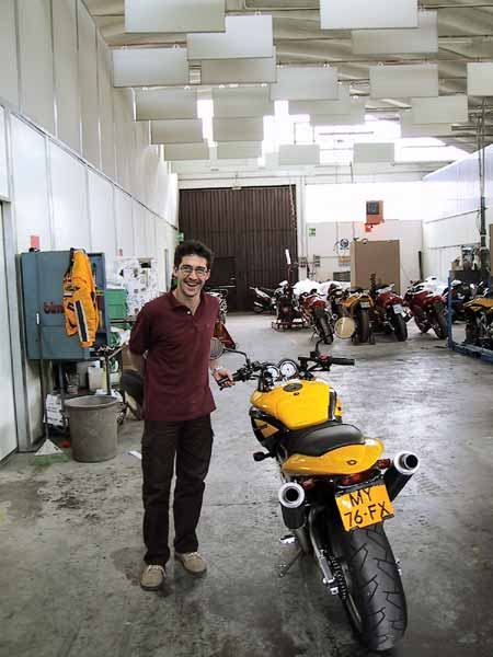 Laughing employee of Bimota next to our Mantra
