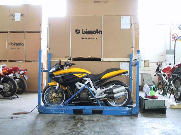 Bimota Mantra in front of boxes