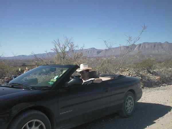 Ernst in a Chrysler convertable