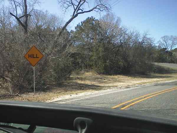 Warning sign for a hill