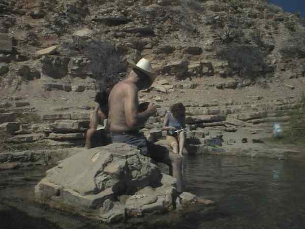 People with their feet in the water